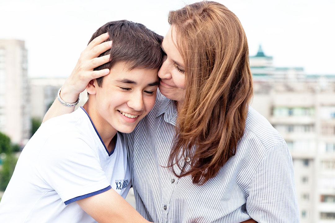 Portrait of a mother with her son teenager