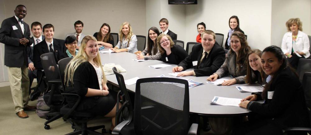 4-H youth meet with Department of Education representatives to discuss bullying prevention.