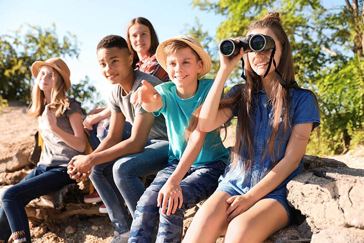 group of young teens enjoying the outdoors