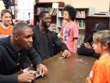 Carlos Dunlap talks with kids on his anti-bullying tour. 